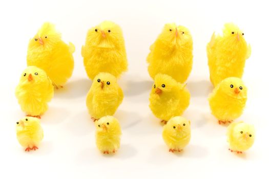 Small yellow estern toys on white background