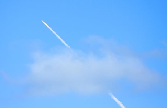 Vapor trail of Space Shuttle Discovery as it launches successfully from Cape Canaveral at 5:02 PM, EST.