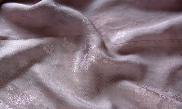 antique Chinese lavender silk with a floral design