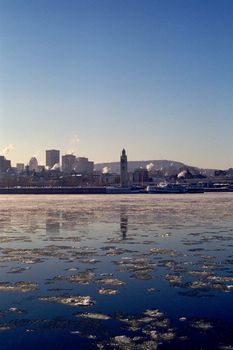 Old port of montreal view from Jean-Drapeau island during winter