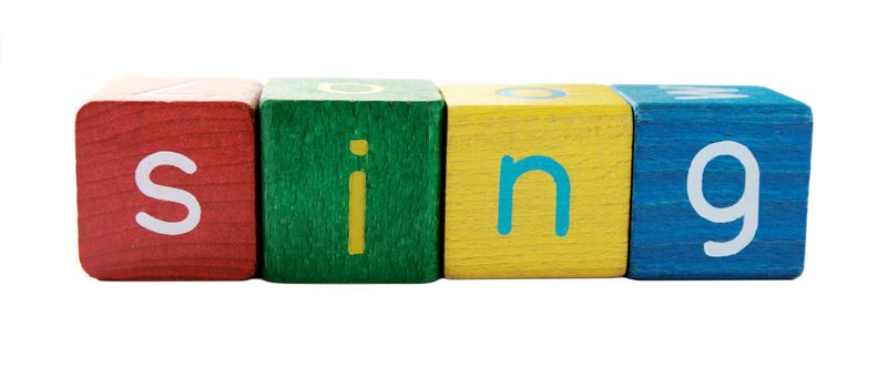 the word 'sing' in colorful children's block letters