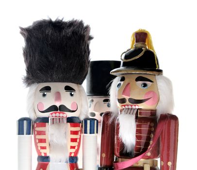 three nutcrackers isolated on white