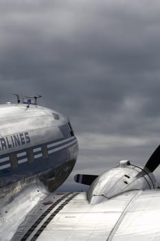 Old airplane (dc-3) with blue toning against the sky.