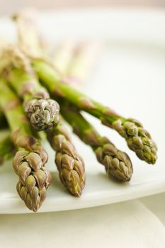 Pile of asparagus on the kitchen table