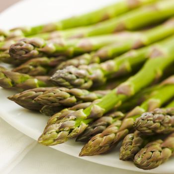 Pile of asparagus on the kitchen table