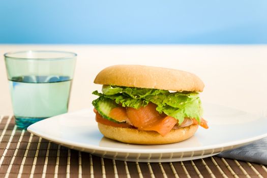 Cold smoked salmon bagel on the table