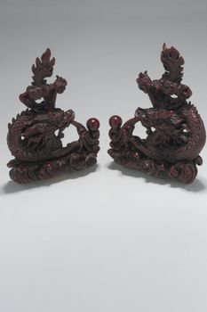 two small dragon statue position in mirror position