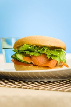 Cold smoked salmon bagel on the table