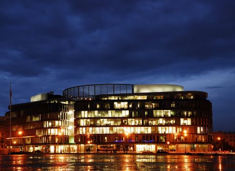 Warsaw Metropolitan building by Norman Foster. Night view after the rain.