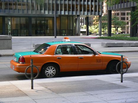 A car of taxi in full city center of Toronto