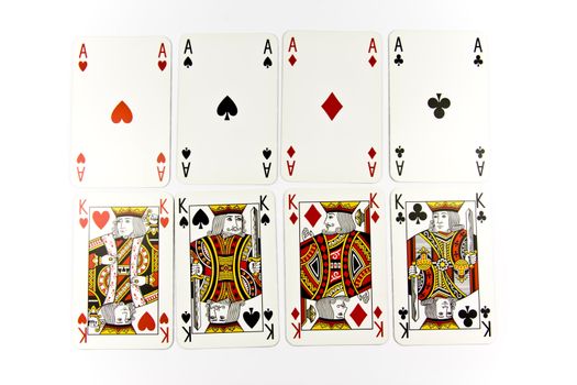 Four kings and aces of cards isolated on white