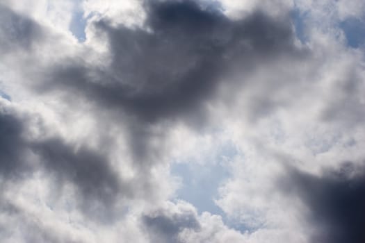 Dark cloud on blue background