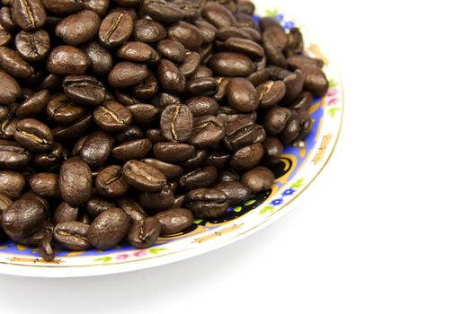 Coffe beans with plate isolated on white background
