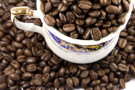 Half cup of coffee on white and brown