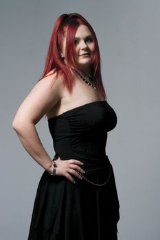 Red hair female model with goth rock look