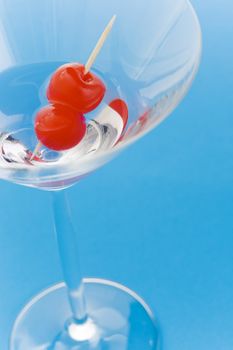 Close up of a cocktail over a blue background