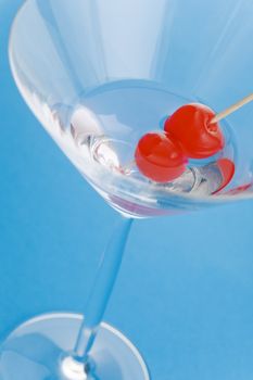 Close up of a cocktail over a blue background