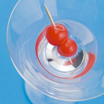 Close up of a cocktail over a blue background