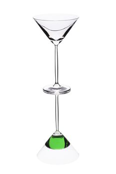 Empty cocktail glass on the white background with reflection.