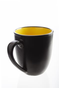 Isolated black coffee cup on white background with reflection