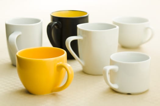 Different coffee cups on the kitchen table