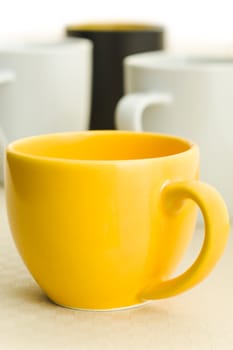 Different coffee cups on the kitchen table
