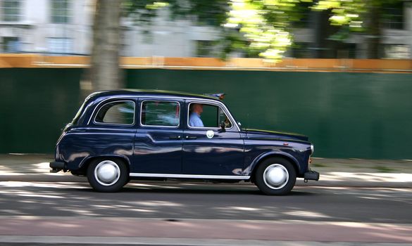 London Taxi car with motion blur effect