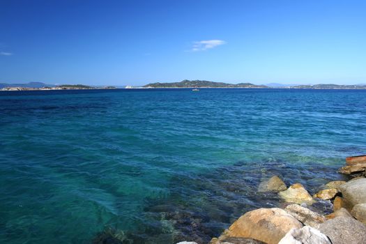 Perfect Blue Sea with coast on horizon