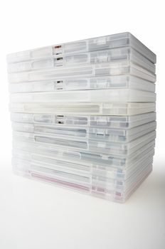 Stacked dvd jewel case boxes on white background with clipping path