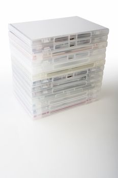 Stacked dvd jewel case boxes on white background with clipping path