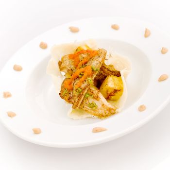 White fish and pinapple with peanut and pepper dressing