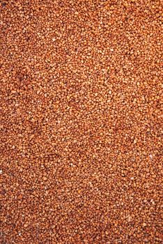 Texture shot of small red pebbles and stones, filling the whole frame