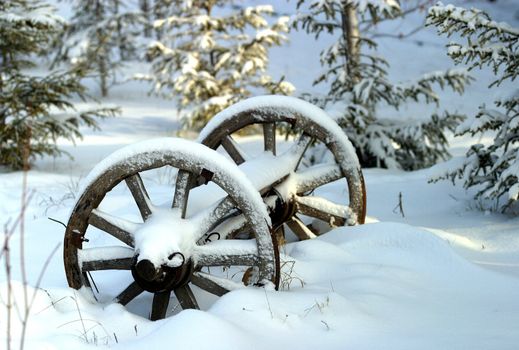 Wheels of a cart in snow