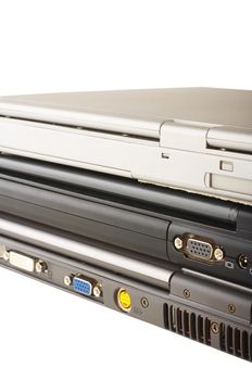 Three laptops stacked on the white background