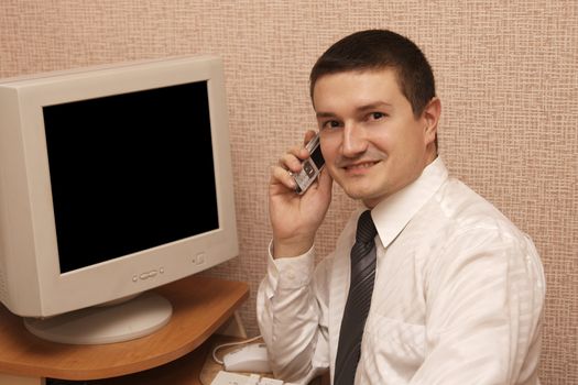 smiling man with mobile