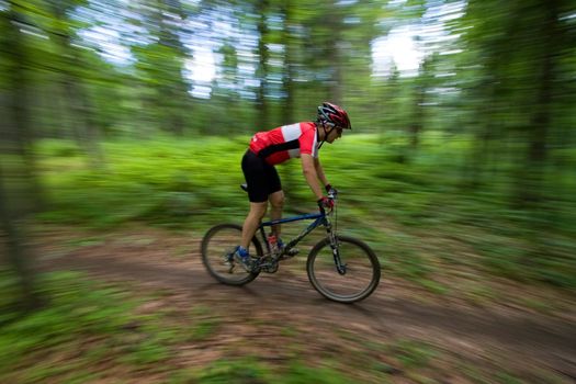 Mountain Biker during mtb competition with blurred background