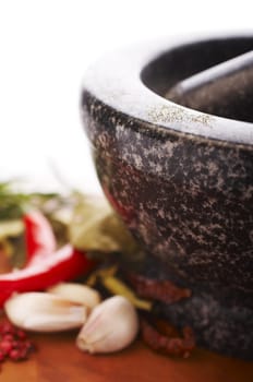 Mortar with thai spices (garlic, chili, pepper, lemon grass)