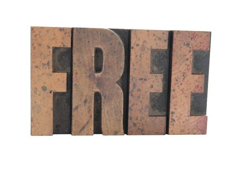 the word 'free' in old wood type letters with a reflection