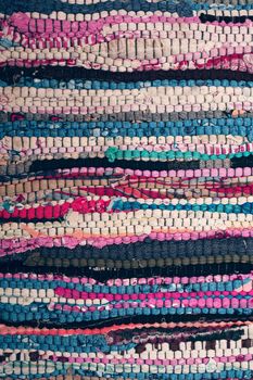 Multi-coloured structure of a carpet connected in manual