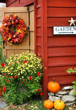 Autumn wreath on barn door