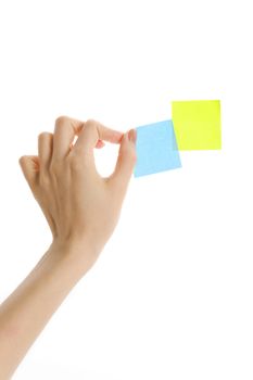 Putting sticky notes on the wall (isolated)