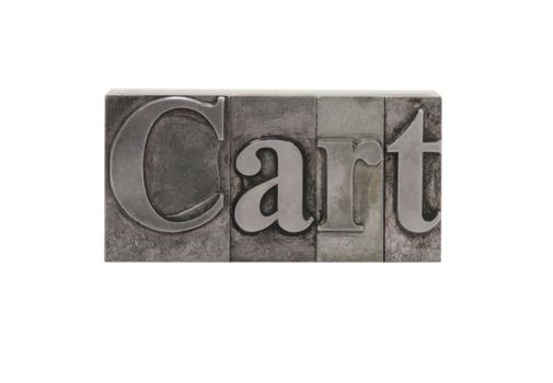 old metal letterpress letters form the word 'Cart' isolated on white