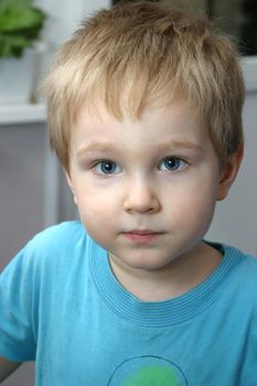 Portrait of the child looking upwards