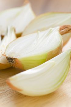 Onion halves with on the chopping board