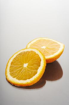 Orange fruit sliced on the two halves