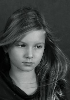Portrait of the girl with fluttering hair