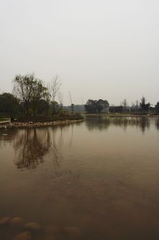 Landscape from China (artifical lake with island and forest)