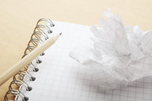 Crushed sheet of paper ripped of from notebook 