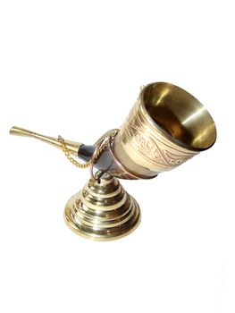 golden goblet against a white backgroung