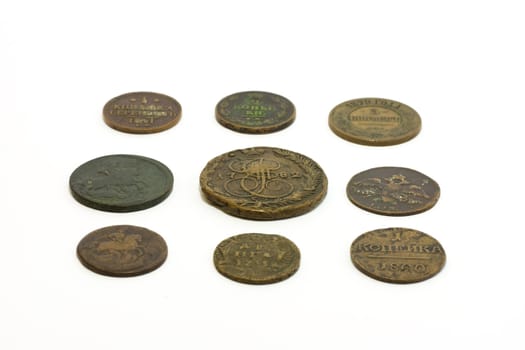 Old coins of Russian Empire on white background
